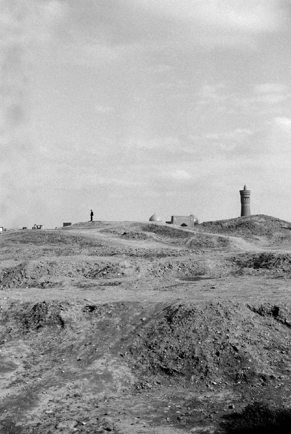 A small boy standing on the ruins of the Arc of Bukhara, Bukhara, Uzbekistan, 2024