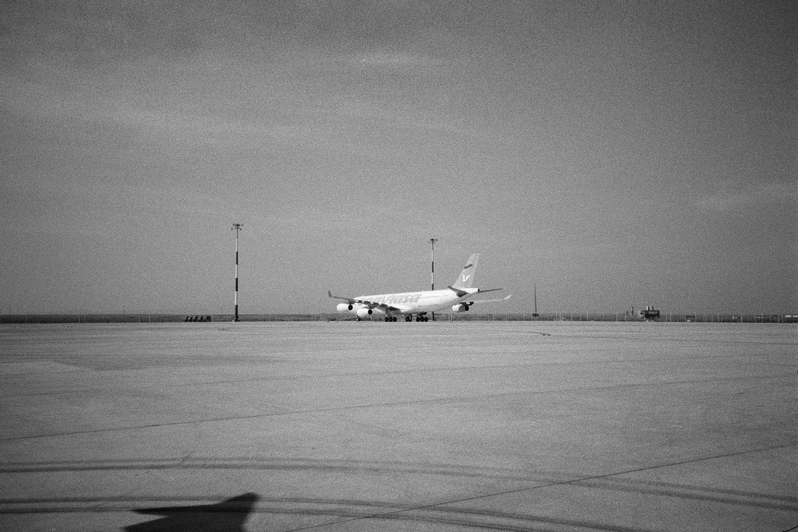 Black-and-white photograph: Imam Khomeini International Airport, Tehran, Iran, 2024